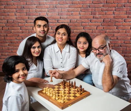 family playing chess