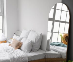 Mirrors looming over the bed